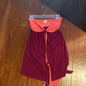 a purple and pink short strapless dress